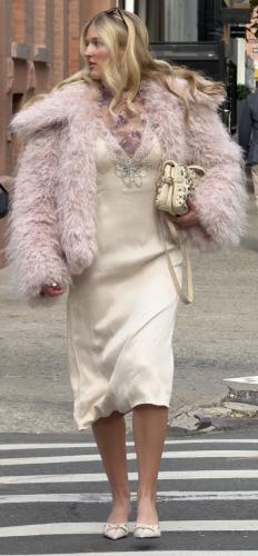 purple lace long sleeve topped with a pink fur coat