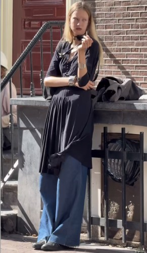 Dresses layered over jeans