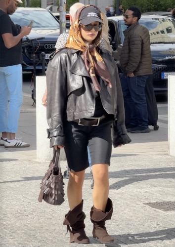 leather coat over cropped black pants