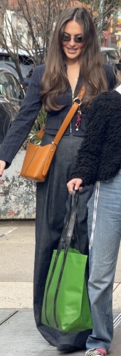 pinstriped coat, light denim trousers, black boots