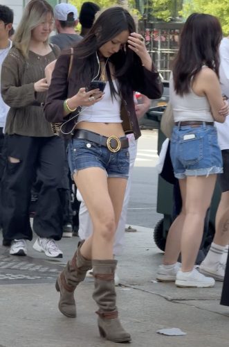 denim shorts with a brown leather belt