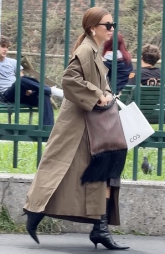 dark nude trench coat and sleek black stiletto boots